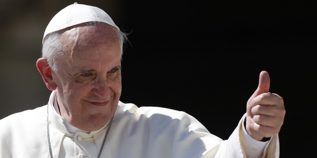 Pope Francis gives his thumb up as he leaves at the end of his weekly general audience in St. Peter's square at the Vatican, Wednesday, Sept. 4, 2013. (AP Photo/Riccardo De Luca)