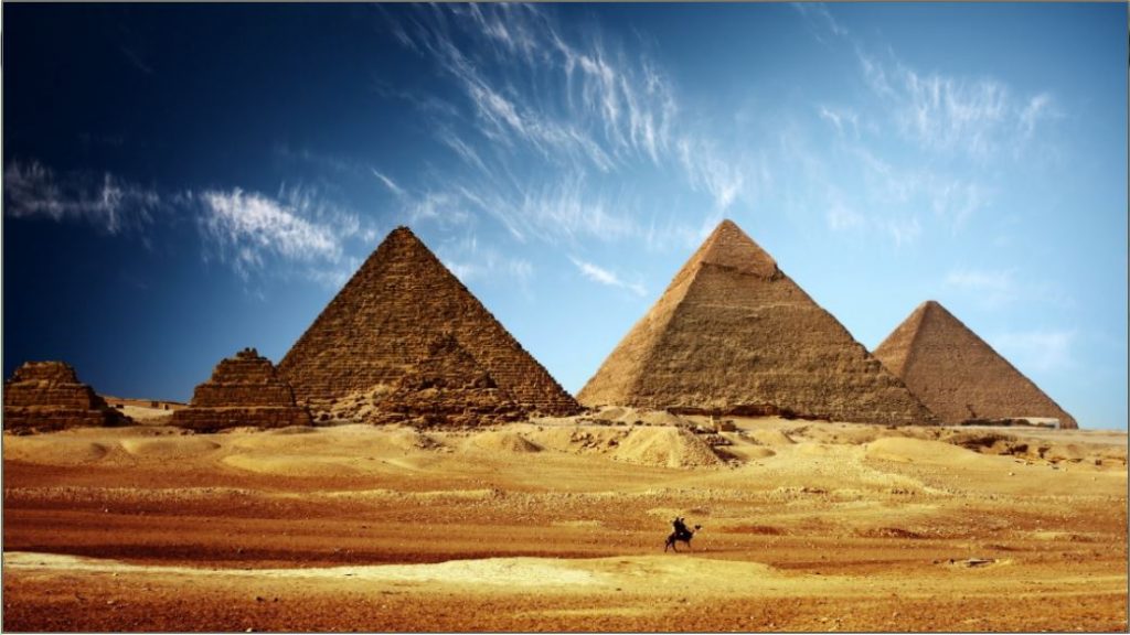 pyramids_egypt_sand_desert_camel_sky_heat_47995_3840x2160