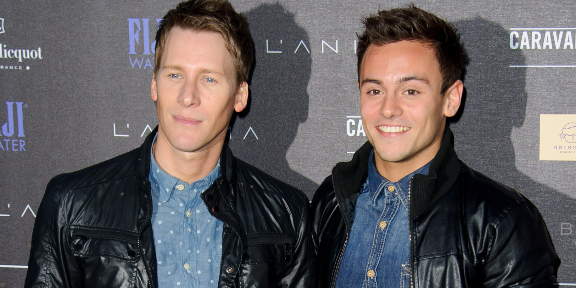 British athlete Tom Daley, left, and U.S screenwriter Dustin Lance Black arrive for the Battersea Power Station Annual Party at a central London venue, Wednesday, April. 30, 2014. (Photo by Jonathan Short/Invision/AP)